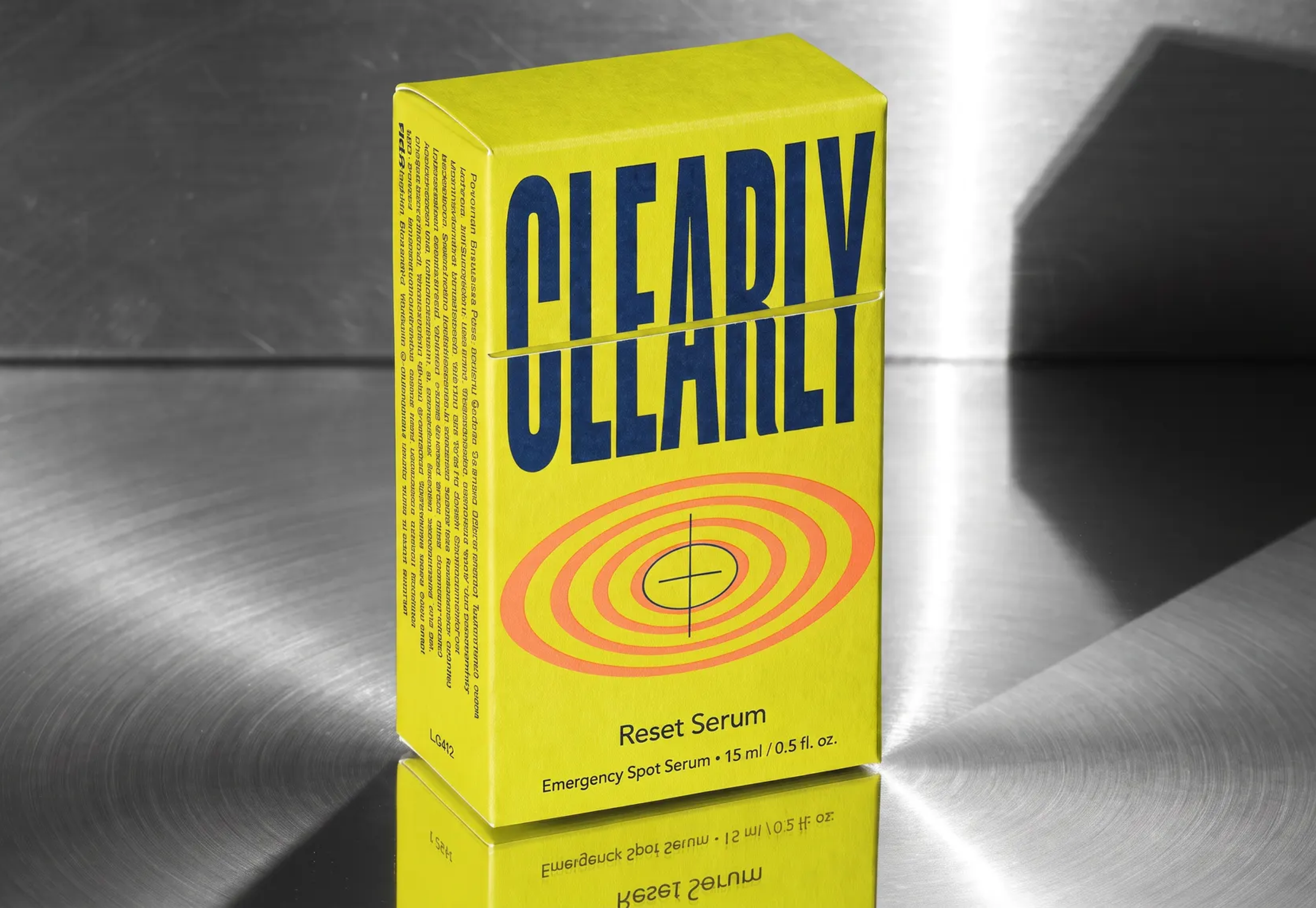 Clearly, a bright yellow box on a brushed metal surface