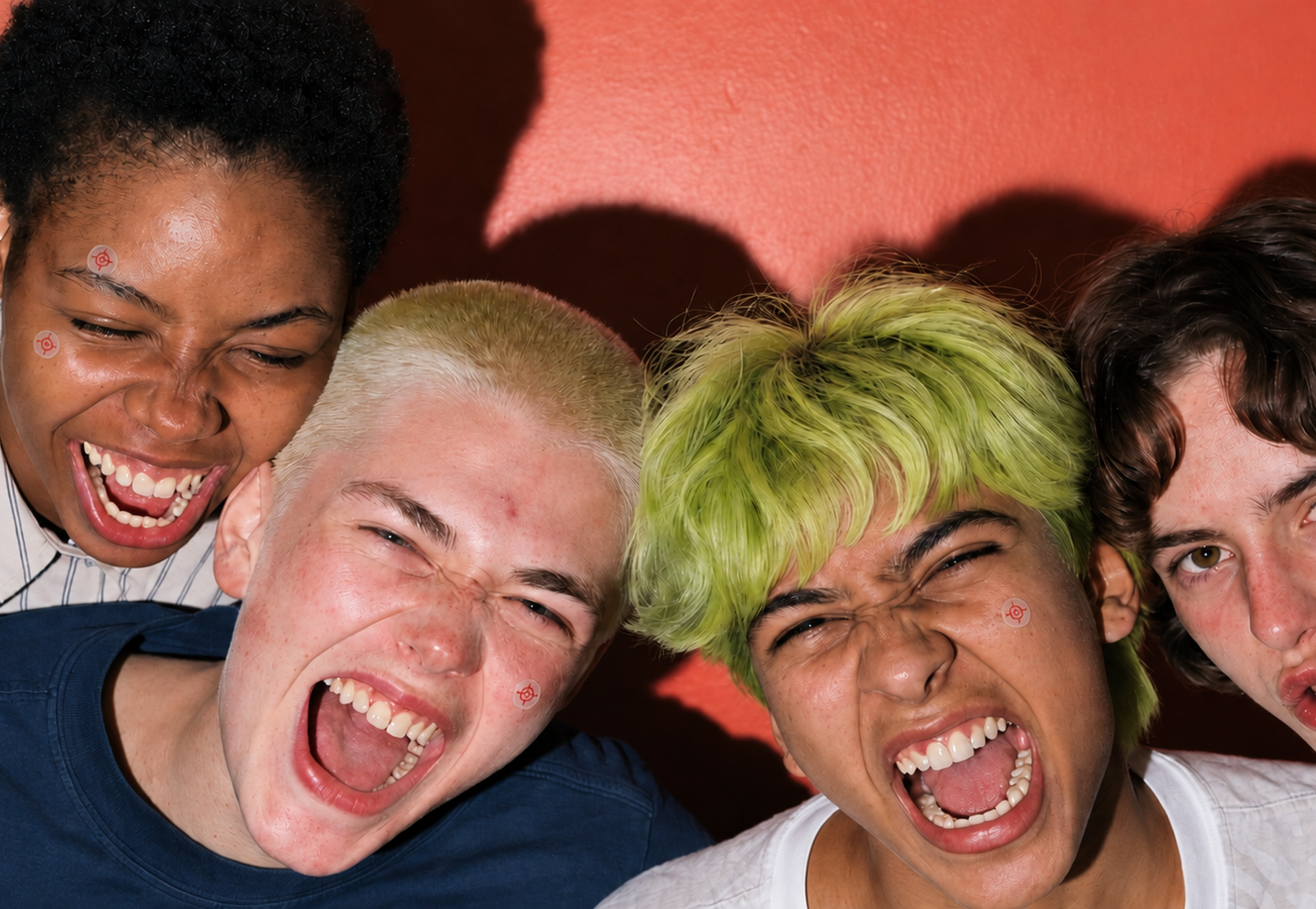 Clearly, a group of friends laughing and shouting together