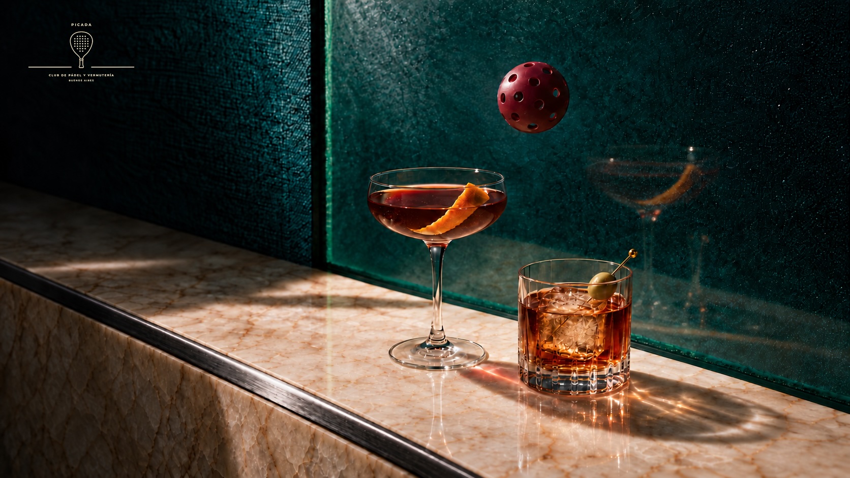 Picada, cocktails on a marble ledge in afternoon light with a padel ball in the air